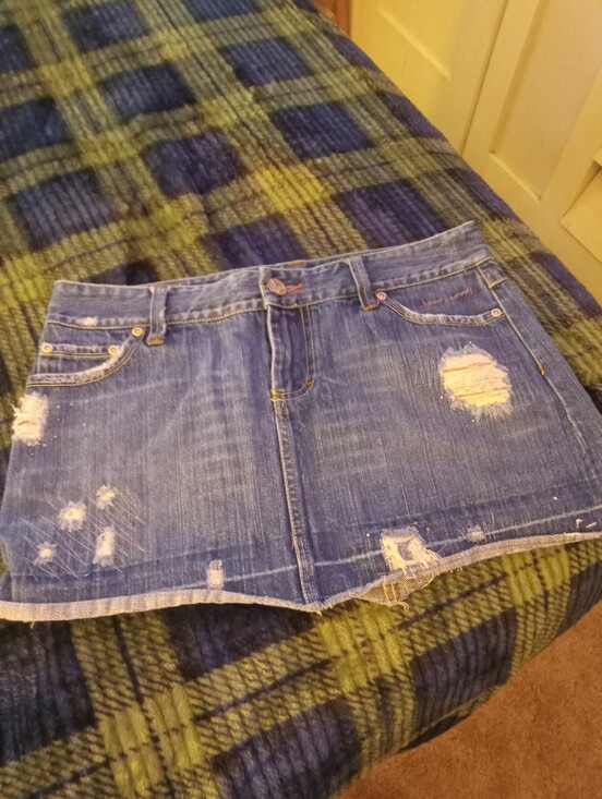 American Eagle Outfitters Dresses & Skirts - American Eagle Denim Distressed Mini Skirt in Blue Size 8